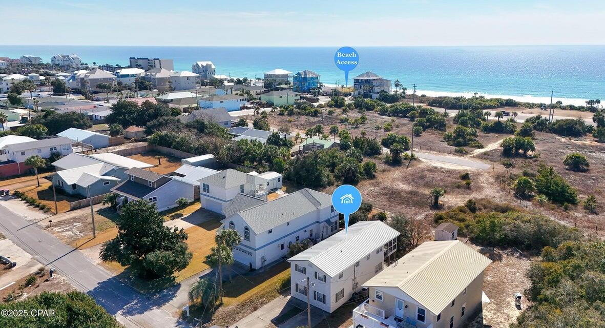 CURRENTLY UNDER CONTRACT, THERE IS ALSO A KICK OUT CLAUSE ON THIS PROPERTYCOASTAL INVESTMENT OPPORTUNITY!! Steps from the Gulf!! Welcome to 22123 Bataan Ave, a rare find just steps to the Gulf! Offering second-story water views & located on a quiet dead-end street, this home presents endless possibilities! This is 100% investment property/ fixer upper! Currently listed as a single-family home, it's designed as a duplex, (and grandfathered in as a duplex as long as you don't change the footprint of the home!) making it ideal for rental income or multi-generational living! Whether you choose to convert it into a true single-family home or complete the duplex setup, this property provides incredible flexibility and investment potential! With the Gulf views, a rare coastal opportunity you won't want to miss!