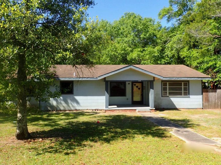 This REO home is located in an established area just minutes from both north and south Crestview. Built in 1961, this larger 1600+ square foot home has 3 bedrooms 1 bath detached storage/garage and fenced back yard. Floors are beautiful original hardwood which could easily be brought back to life. This property rests on one of the larger lots in this area and is absolutely a must see. Call today for your showing.. it will not last!
