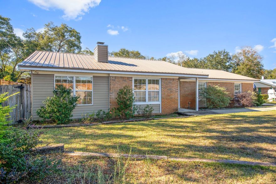 Welcome to this stunning 4-bedroom 2-bathroom home located in the heart of Niceville!! This charming house boasts a range of impressive features that are sure to catch your eye. Step inside & be greeted by beautiful 'wood look' tile floors. The spacious kitchen is a chef's dream, featuring sleek granite countertops that provide ample space for meal preparation & entertaining. With a large outdoor shed/garage, you'll have plenty of room for storage or to pursue your hobbies. The expansive driveway ensures ample parking space for you & your guests. Enjoy the Florida sunshine on the large covered patio, perfect for relaxing or hosting outdoor gatherings. This house offers a perfect blend of style, functionality & convenience. Don't miss out on the opportunity to make this house you next home