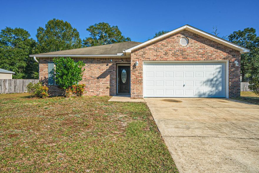 Check out this great home in a great location- North of I-10 & close & convenient to schools, shopping, restaurants & churches; less than 30 min. from all the bases (Eglin/Duke/7th) & less than an hour to FL's beautiful beaches. Newer neighborhood w/ decorative mailboxes, street lights & underground utilities. Open dining/living/kitchen combo. Kitchen has a bkfast bar, center island & pantry. 2 car garage w/ an auto opener, shelving & attic w/ pull down stairs for storage. Split bedrm plan for extra privacy. Master has a walkin closet. Home has hardwood, tile & granite flooring throughout. Call to see today!!