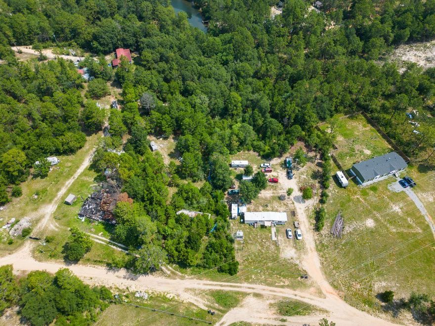 Under Contract-Taking Back up Offers-Don't miss out on this rare chance to own a remarkable piece of land in the highly desirable location of Crestview, FL. Embrace the endless possibilities and create your own private paradise. The property has access to essential utilities, including electricity, city water and also private well and sewage, ensuring a seamless transition for any future development.