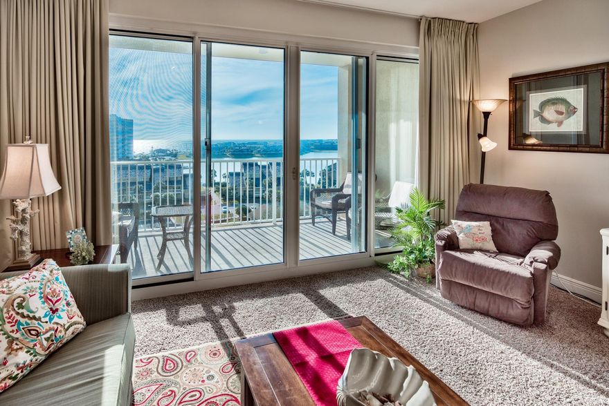 Carpet being replaced with NEW wood look tile! Gulf of Mexico views from this 7th floor 1br 1.5 ba with bunks! Situated within steps of Destin's white sand beach, this condo showcases incredible views of the beautiful Gulf of Mexico and Seascape lake. This stunning condo comes fully furnished and offers master bedroom, hallway bunks and sleeper sofa with full master bath and half bath for guests! Master bath with granite counters, and a large living area with magnificent windows and a large balcony to take advantage of the tranquil views, plus gourmet kitchen with granite counters. Enjoy the resort style amenities including: 24,000 sf of pools (4)seasonally heated and golf course, tennis courts on the resort!Also enjoy outside storage with this unit!