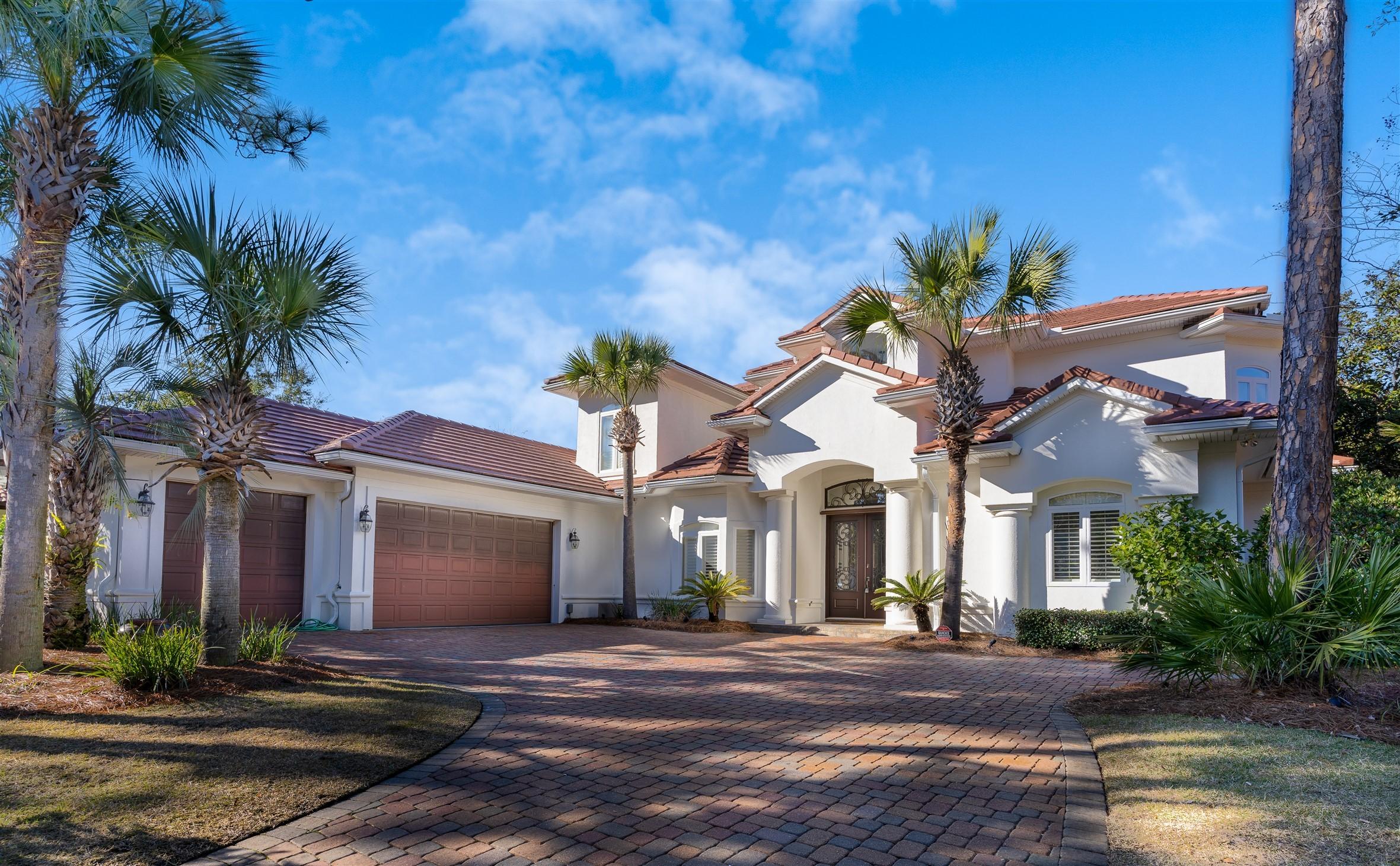 BEHIND THE GATES AT SANDESTIN in BURNT PINE SITS this Beautiful Custom Home ON THE LAKE AND GOLF COURSE. This 5,000 Sq. Ft. home has 4 Bedroom, 4.5 Baths with Office, Two Master Suites, Wine Room with Pool and Outdoor Living Area with Summer Kitchen and 3 Car Garage. House has been Renovated with a New Private First Floor Master Suite and New Kitchen Overlooking Lake and Fairway Views Throughout the Open Kitchen and Living Area. Large Gourmet Kitchen with Quartz Counters, Large Center Island & Stainless Appliances. You'll enjoy 4 bedrooms each with their Own Bath. 2 Guest Bedrooms and an Extra Room for an Office/ Exercise Room Downstairs (could easily be transformed to 4th bedroom). Second Master Suite encompasses the Entire upstairs and has an extra room with a Porch Overlooking the Lake
