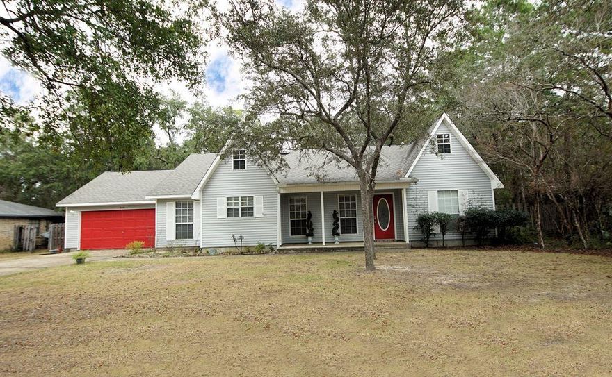 MOVE IN READY home with a fully RENOVATED kitchen on a large, fenced lot in Bluewater Bay! this Randy Wise built home offers a split floorplan and a breezy screened porch. When you enter this home, the dining room will be on your left with a pass through to the GORGEOUS kitchen featuring new cabinets, granite counters and stainless appliances. Adjacent to the kitchen is the large family room with easy care laminate flooring, a vaulted ceiling and two sky-tubes that let in an abundance of natural light. The family room also has two glass sliding doors leading to the screened porch. Just off of the family room is the master bedroom that also has a glass sliding door leading to the screened porch. You will love the updated bath and the large walk in closet as well! On the other side of the house you will find two additional bedrooms that also have walk in closets and another full bath. The large fenced yard is perfect for kids and pets and the oversized garage has a convenient pedestrian door leading to the back yard. According to the owner, the hot tub in the screened porch works but it will convey in AS IS condition. Please note that there is a transferable termite bond with Bryan Pest Control. Start 2020 off right in your new home!