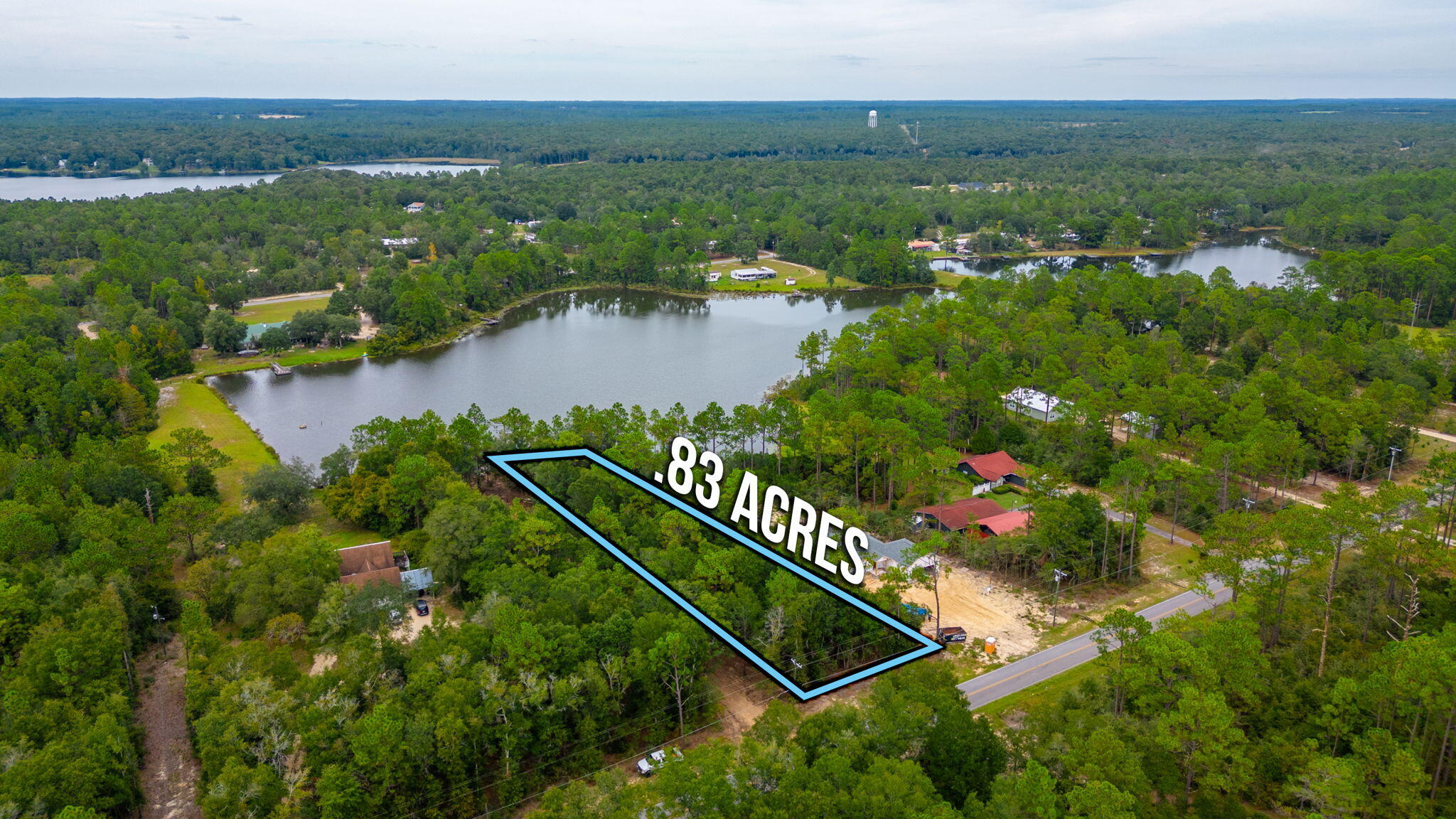 LARGE WATERFRONT LOT in North Walton County, Florida and it's priced to sell!! This lot is a little bit over 0.83 acres and has about 90 feet of waterfront on Imperial Lakes. There is a mixture of mature oaks, pines and magnolias, among others. You're own little paradise! The property does have access to public water and power. Being located on a paved county-maintained road, gaining access to the property is very easy. There is also already a cleared path/driveway leading from the road almost all the way back to the water. A short drive from this property will get you to the historic downtown area and less than an hour drive South can take you to the beautiful white sandy beaches of Walton County. Imperial Lakes does not allow gas motored boats however, electric motors and paddle boards are welcome. With this property you would have the luxury of being right on the water with the luck of not much of it being in a flood zone. Mobile/manufactured homes are not allowed in this subdivision. Buyer to perform due-diligence & verify all pertinent information. No home allowed less than 850 square feet of living space.