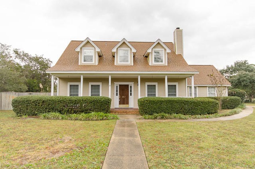 Own your Home in this exclusive community of Emerald Pointe & enjoy it's own private beach access with an entertaining picnic area to relax, play or just enjoy the sun set and rise! Convenient location minutes from Hurlburt AFB, Beaches & Shopping! This 3 bed 2 bath home offers a spacious living room with fireplace, Tiled counter tops in kitchen with beautiful custom cabinetry! You will love the breakfast bar and sunlit breakfast room & large separate dining room. Master suite downstairs with walk in closet & private bath with separate shower & whirlpool garden tub, double vanities! 2 Bedrooms & bath, a large attic storage room upstairs. You will love the large Ranch Style front and back porches! Privacy fenced back yard with plenty of space, sprinkler system, much more! Call to see today