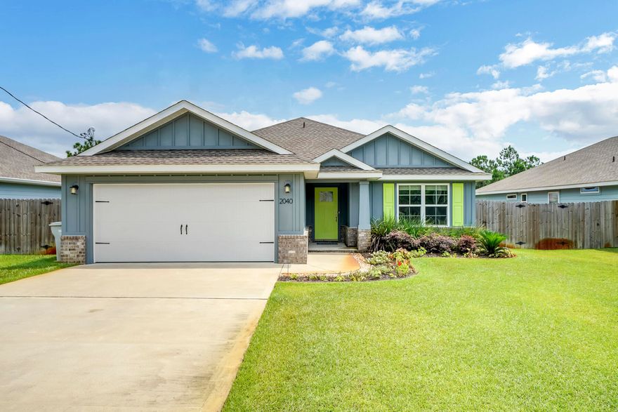 Check out this beautiful, move-in ready home located in Navarre. It offers an open floor plan with 4 bedrooms and 2 baths. The kitchen has custom cabinets, granite countertops and a large island for entertaining. Home has a spacious master bedroom and bath with a double vanity and custom tiled shower. In the evening you may find yourself sitting out back on the covered porch enjoying the large fenced in yard. This home is located a short distance to the Waterfront Navarre Park.