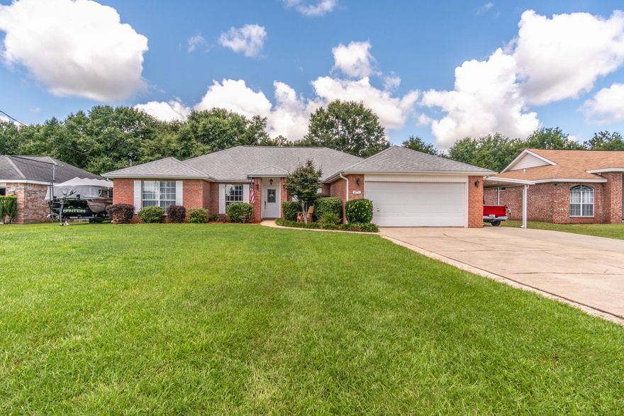 GORGEOUS 4 bedroom POOL home SOUTH of I-10! Property has been meticulously maintained, inside and out, and pride of ownership abounds. Nicely landscaped with SCREENED in-ground pool (NEW liner 2017) with roll-out solar cover and new saltwater chlorinator (July '18). NO carpet-tile and laminate throughout; NEW kitchen 2015-solid wood cabinetry, granite countertops, stainless steel appliances (dishwasher new June '18). New bathrooms 2017. Great split bedroom floor plan with formal dining and office/flex space. New hot water heater 2017. AC and roof 2010. MOVE-in READY on a large, FLAT lot located on a cul-de-sac! Extended parking pad -bring your boat/RV! Schedule your showing today!Measurements are approximate-all information deemed important to be verified by buyer.