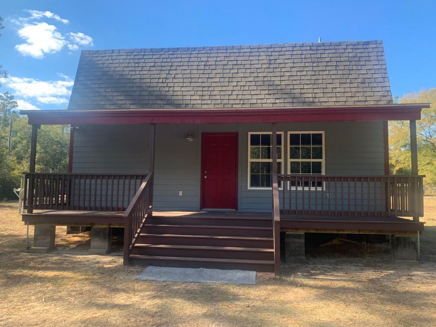 Adorable 1 bedroom, cozy home with plenty of land! Very well-kept and clean. It even has a half bath downstairs for guests and company, along with a laundry room with a barn door! It features a large kitchen with an island and stainless steel appliances. There's plenty of windows to bring in natural sunlight and brighten up this home. The driveway has a gate, leading up to the home. Check out the shed in the back yard for extra storage! Large walk in closet for storage and plenty of clothes. The AC unit has a remote for easy temperature control. You would never know it is under 1,000 sq ft with all of the large feature this house has! Perfect for a small family or a starter home. Super quiet and peaceful neighborhood. Can't beat this! Come make this your home today! Next to Blackwater !