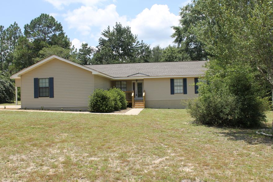 You will LOVE the facelift this house has had!!! The kitchen, living and dining have been opened up for your full enjoyment of the gorgeous stone fireplace. Fresh paint, tile floors that look like wood floors and new lighting are just a few of the features that have been added to this home. The exterior has all new siding and a new deck. Situated on a quiet one acre lot close to post office, library and shopping! Seller pays most closing costs at full price.