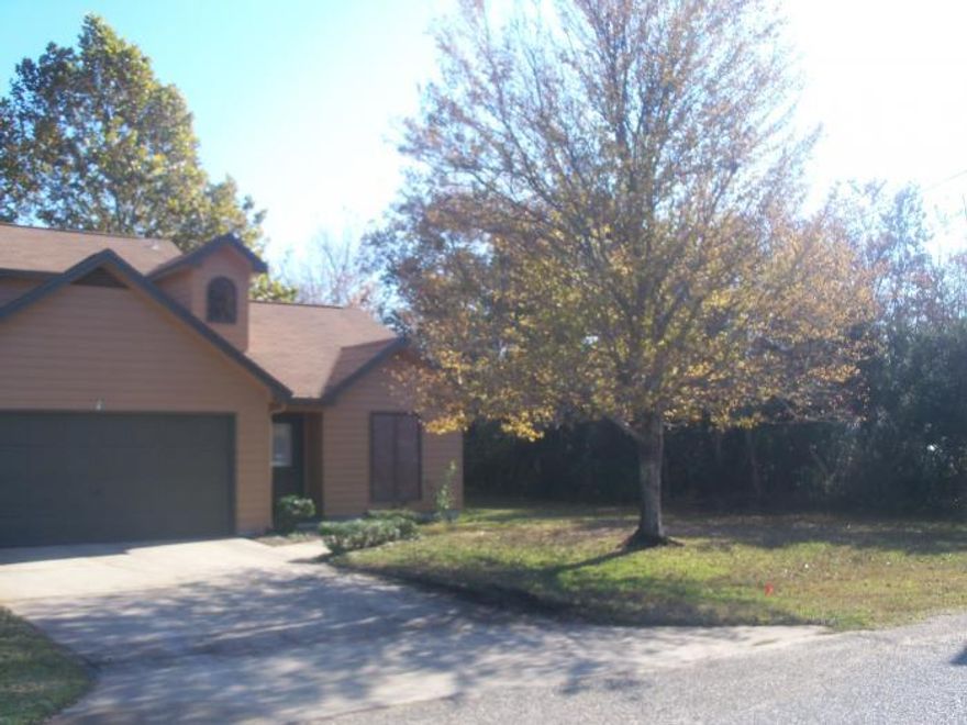 GREAT FOR FIRST TIME HOME BUYERS OR INVESTMENT PROPERTY!!!! NOT A SHORT SALE. This well maintained home sits off HWY 98, down a quiet street just about a mile from Hurlburt Field. Offering upgrades and closet space usually seen only in much larger homes. Tile in kitchen, half bath, master bath and upstairs bath. New flooring in living room and hall and master bedroom. Master bedroom has 2 extra large closets and ceiling fan. Other bedrooms and full bath are upstairs. Both bedrooms have oversized closets, ceiling fans and sliding doors that have a connecting balcony that over looks the shaded back yard. Living room has upgraded fans, cathedral ceilings and a wood fire place. Fenced back yard has a screen porch and lawn shed for extra storage. Call for a showing.