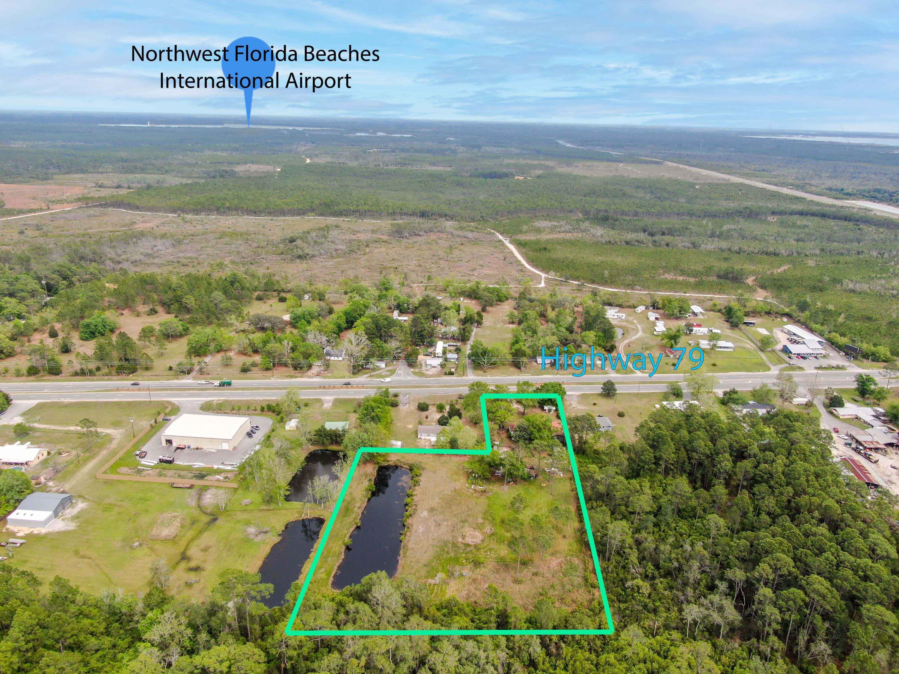 Panama City Beach, FL. is busting out of its seems, and this small family farm is now in the middle of all the hustle and bustle of a growing beach community. This property is zoned commercial, village mixed-use, along Hwy 79, a 1/4 mile north of the main entrance of Margaritaville Latitudes PCB. The property boasts approximately 130' on Hwy 79 Rd., Southbound traffic. It is an excellent location for almost any commercial business wanting high traffic and visibility close to PCB. The airport is 6.5 miles west. Pier Park and the emerald waters of the Gulf of Mexico are 8.4 miles South. FSU Health-Tallahassee Memorial Medical campus is 5 miles south and is scheduled to open in late 2024. The mobile home has been sold and is expected to be moved. Being sold as vacant land.