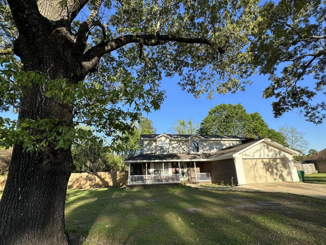 Settle down in this stunning two-story house located in the serene North end of Crestview! This house has everything you could possibly want, starting from the large privacy fenced backyard with a beautiful gazebo and storage shed, perfect for hosting family and friends. The spacious living room leads you to the elegant kitchen equipped with stainless steel appliances and ample cabinet space, making cooking a breeze. With three bedrooms and two and a half bathrooms, there's plenty of room for your family, and the bonus room can be used as an office or guest room to suit your needs.