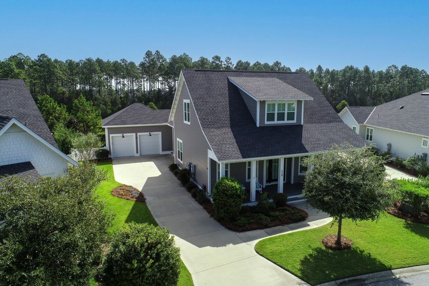 Welcome to this stunning home in the highly sought-after Watersound Origins community.  Boasting 4 bedrooms and 3 bathrooms, this residence offers a perfect blend of modern elegance and coastal charm.  Step inside and be greeted by an open concept kitchen and living area, ideal for entertaining guests or spending quality times with loved ones.  The spacious master bedroom and bathroom ensuite on the main level provide a serene retreat, while a convenient guest bedroom on the same level offers comfort and privacy.  The interior features are truly exceptional, with the warmth of 10' ceilings, the timeless charm of shiplap accents, custom kitchen cabinets with decorative lighting, exquisite hardwood floors and separate dining area that adds a touch of sophistication to every meal.