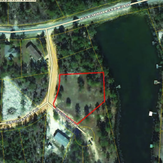 CLEARED, Water Meter, Small Dock - ready to build on this level Waterfront Lot -only a gentle slope down to the water. Lake is a 7 Acre Lake, just outside the City Limits of DeFuniak Sprigs. Elect. available, and cable available. ALSO, will build to suite - NEW Home on Lot next door(left) available. Although lot on unpaved Street, it only about 200 feet off paved Street.