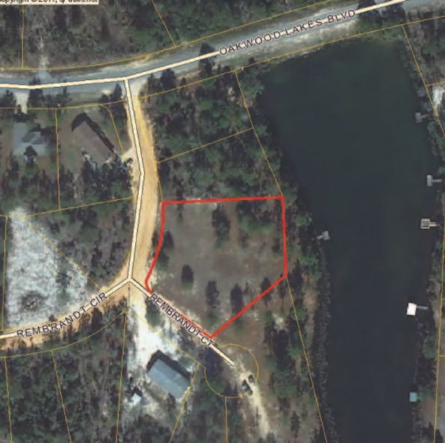CLEARED, Water Meter, Small Dock - ready to build on this level Waterfront Lot -only a gentle slope down to the water. Lake is a 7 Acre Lake, just outside the City Limits of DeFuniak Sprigs. Elect. available, and cable available. ALSO, will build to suite - NEW Home on Lot next door(left) available. Although lot on unpaved Street, it only about 200 feet off paved Street.