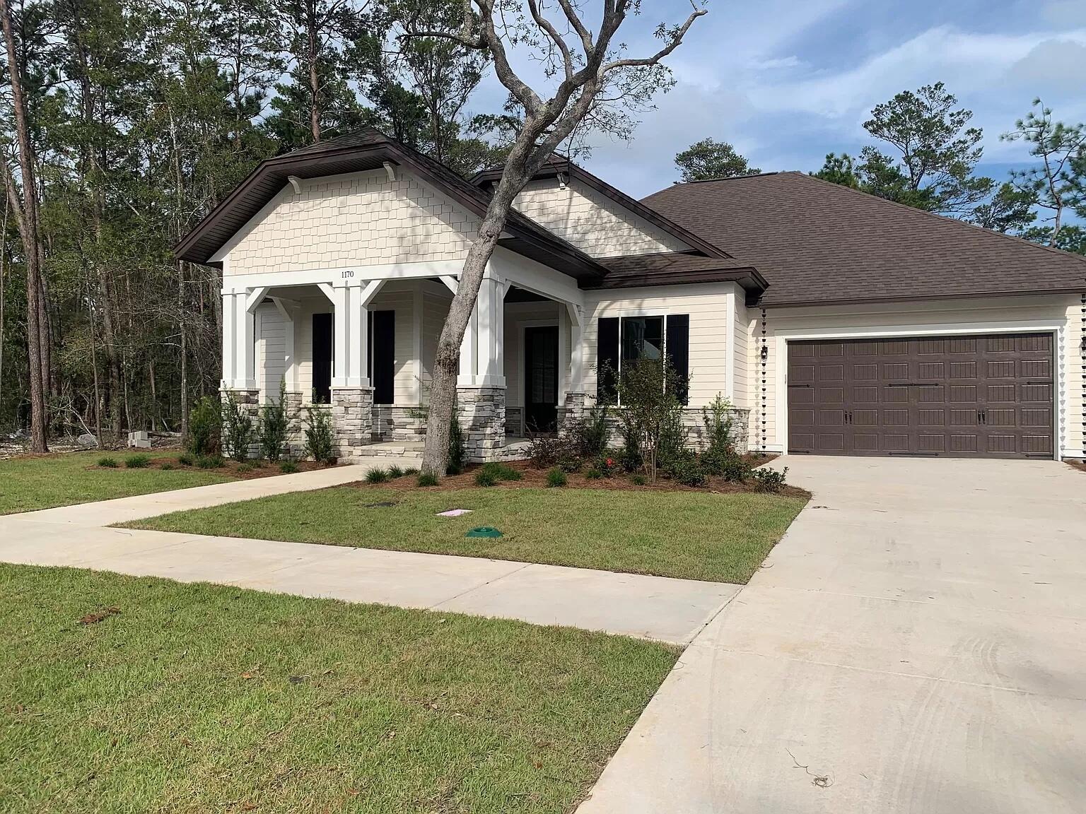 RARE OPPORTUNITY TO RENT in Niceville's newest community, DEER MOSS CREEK! Charming craftsman style home backs up to the private, Eglin Preserve. One story, open floor plan w/3 bedroom plus a bonus room and 2 baths. Home features quartz counter tops in the kitchen with light and bright shaker-style cabinets and large kitchen island. Stainless appliances including gas stove will delight any chef. You'll enjoy the extra storage in the pantry. Engineered, wood flooring in main living areas, tile in wet areas & carpet in bedrooms. Grand master suite includes double vanity and spacious walk in shower. Spacious guest bedrooms and bath will make company feel right at home. There is even a mud room off the garage to kick off your shoes and hang your backpacks.