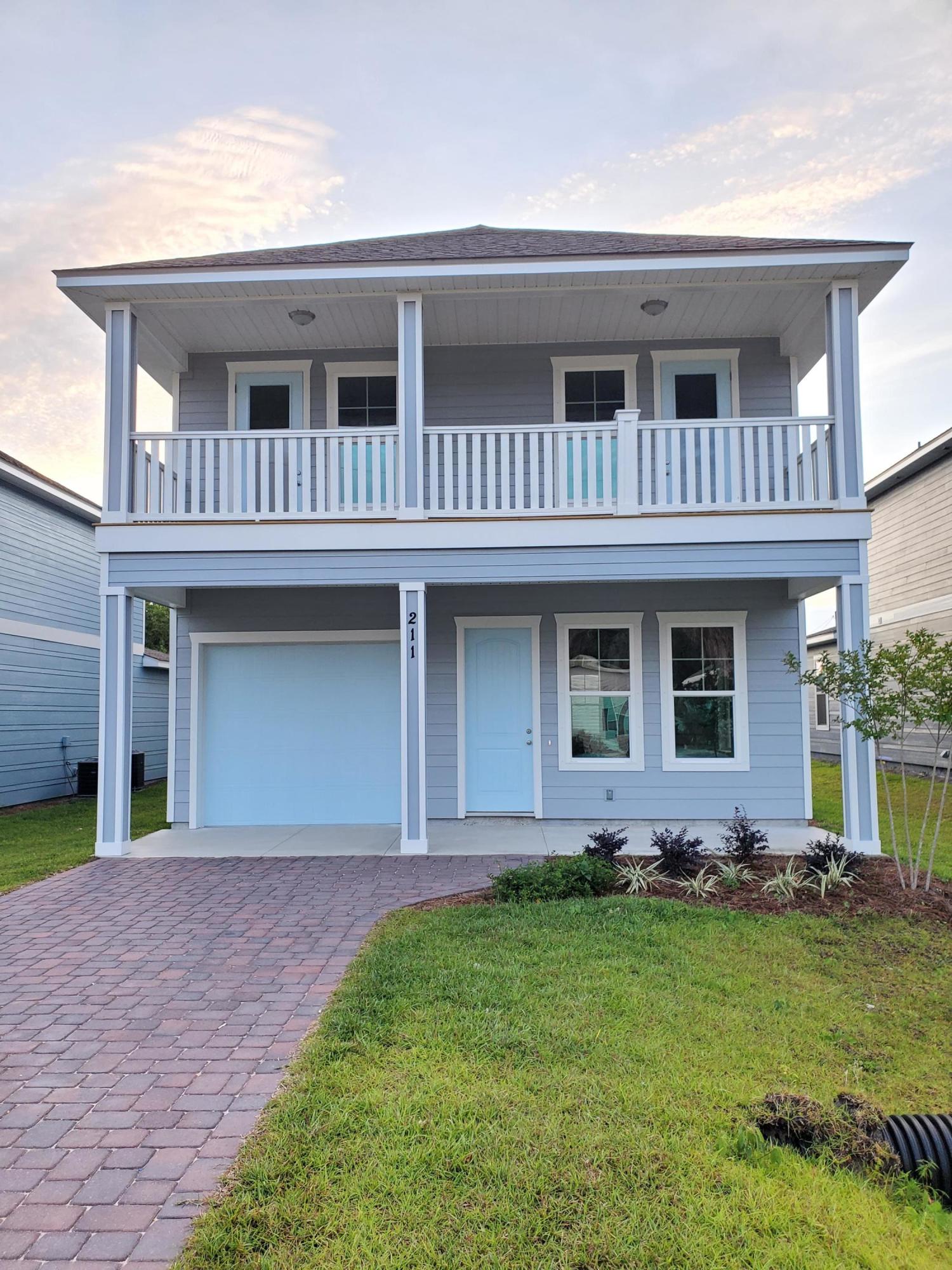 NEW CONSTRUCTION!! WEST END PANAMA CITY BEACH!! Location, Location - One Block North of The Gulf of Mexico with Gulf Views from the 2nd Story Porches. This beautiful 4 Bedroom, 3.5 Bath New Construction Home features 9/10 Foot Ceilings...10Ft First Floor and 9ft 2nd Floor. 2 Master Bedrooms. The Kitchen has All Wood Cabinets with Soft-Close Doors and Drawers, Granite Counter Tops with under Mount Sinks, Breakfast Island and Whirlpool or Maytag Stainless Appliances. Some of the Standard Features include: Tremendous Master Walk-In ''Step Down'' Shower, 8ft Interior Doors, Crown Molding, Paver Driveways, Upgraded Carpet and Pad, 14 SEER Heat Pumps, LOW E Double Paned Windows, Spray Foam Attics and Insulated Garages. Put this wonderful New Home at the Top of your List of Places to See