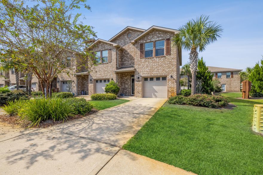 Come check out this Beautiful End-Unit Townhome in an awesome community! This Two-story townhome features a privacy fence and artificial turf so you don't have any lawn care to worry about. The HOA does a wonderful job upkeeping the outside of the townhomes, as well as termite/insect prevention. Reserve Pointe community also has a lovely community pool, a playground! This units garage has convenient added storage space! Also notice the well-cared for carpet, and tiled upstairs hall and bathrooms. The home has great natural light when desired, and the home has a warranty with American Home Shield! The spacious 3 bedroom two and a half bath is conveniently located close to the beaches, Navarres best shopping areas, and makes for a convenient commute to Hulrburt Field if needed!