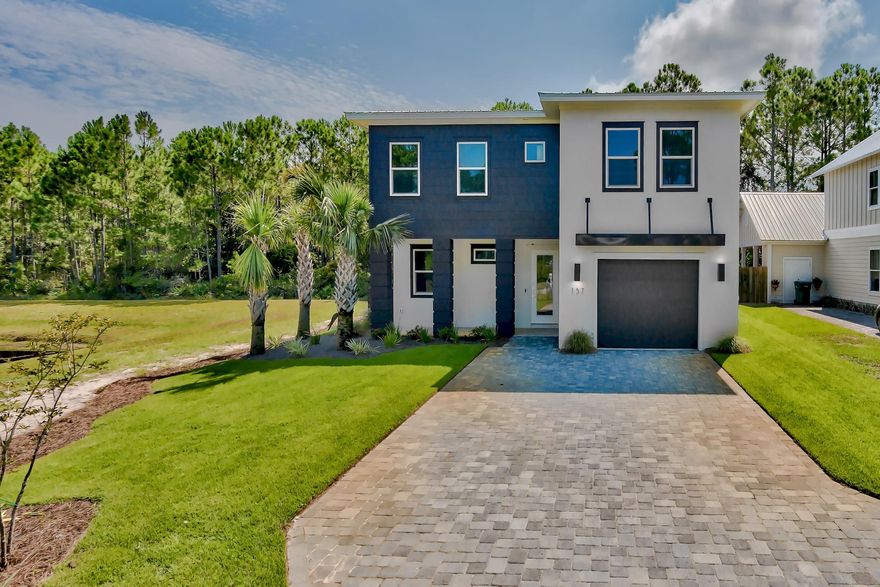 EARN AN EST 16-28% RETURN ON CASH OR $20,320 TO $34,839 PER YEAR! NEW HOME WITH STREET LEGAL GOLF CART! Tired of the same style Home & same floor plan? WANT TO STAND OUT & OWN A NEW & FRESH STYLE HOME? It will be love at first sight upon entering this brand NEW industrial meets coastal chic Home! The successful mix of industrial elements, 20 ft soaring ceiling & custom coastal chic furnishings provide an immediate ''Wow'' factor! Plus,$79,000 average rental projections make it a perfect beach get away. This Home's desirable wide open floor plan offers a spacious Living & Dining area & stunning white Kitchen w/quartz counters, SS app's, gas stove & large island. The spacious 1st floor master adjoins his & her closets & a luxurious master bath w/oversized walk in shower.  Floating his & her vanities, lighted mirrors & custom tiled walls provide a contemporary feel. The 2nd floor master has an en suite full bath. 2 add'l very large bedrooms, there's plenty of room to add multiple custom bunk beds to maximize rental income. Other features include polished concrete floors, 10 & 9 ft ceilings in the bedrooms, 8 ft doors throughout main floor, $3,000 of "Big Ass brand fans", 2 HVACs, tankless gas water heater, washer & gas dryer,  wireless central vacuum w/hide away hoses, 1-car garage, sprinkler system with well, generator ready w/automatic transfer switch, and plenty of parking for 5+ cars.  Sitting in the quiet back corner of the gated community, Frangista Beach, next to a lovely pond, enjoy a tranquil setting w/natural views. NO loud renters next door. The beautiful Frangista community pool & clubhouse, and the white sandy beach & crystal blue waters of the Gulf of Mexica are within walking distance.   Great restaurants, shopping & golf are near by as well. Ideal as a primary, 2nd home or investment property, act now as this one-of-a-kind, amazing Home won't last long.