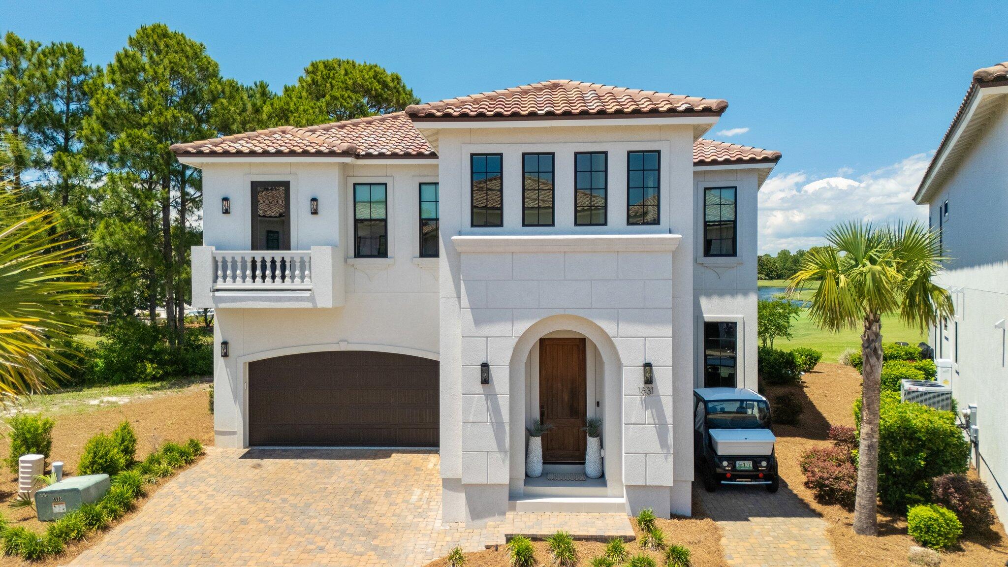 Discover luxurious living in this remarkable 4,343 sq ft home that backs up to the beautiful Burnt Pine Country Club golf course. Built in 2023, this residence offers two master suites, an elevator, and stunning views of the 17th green and the serene golf course lake. One of the guest bedrooms has been innovatively converted into a state-of-the-art golf simulator room, perfect for honing your skills year-round. Additional features include a two-car garage and convenient golf cart parking with an outdoor plug-in. Furthermore, the neighborhood is set to break ground on a new community pool in 2025, adding to the fantastic amenities available to residents.**Purchase History Incorrect on MLS, lot purchased by current (original) owner 10/8/21 for $400,000 then constructed new home**