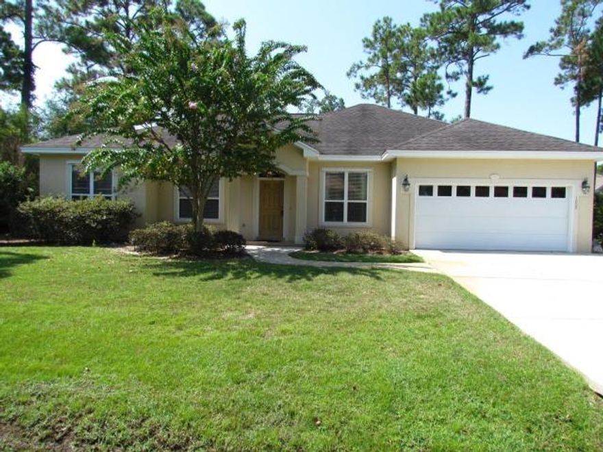 Location, Location, Location!. This Florida style split floor plan home has 3 bedrooms, 2 full baths, dining room, breakfast area AND an office. There are arched doorways, bull nose corners and crown molding throughout. The rooms have updated lighting and custom window treatments that will convey with the sale. Drapes in the bedrooms and great room are blackout solar shades. There is tile in living areas and Florida room. Master bedroom has high ceilings, door to the patio and master closet has built in shelves and drawers. There is a lovely tiled Florida room which has outdoor speakers, perfect for summer evenings. Home has a generator AND ...Hurricane shutters. Dishwasher and microwave are new. Washer Dryer do not convey with the property.