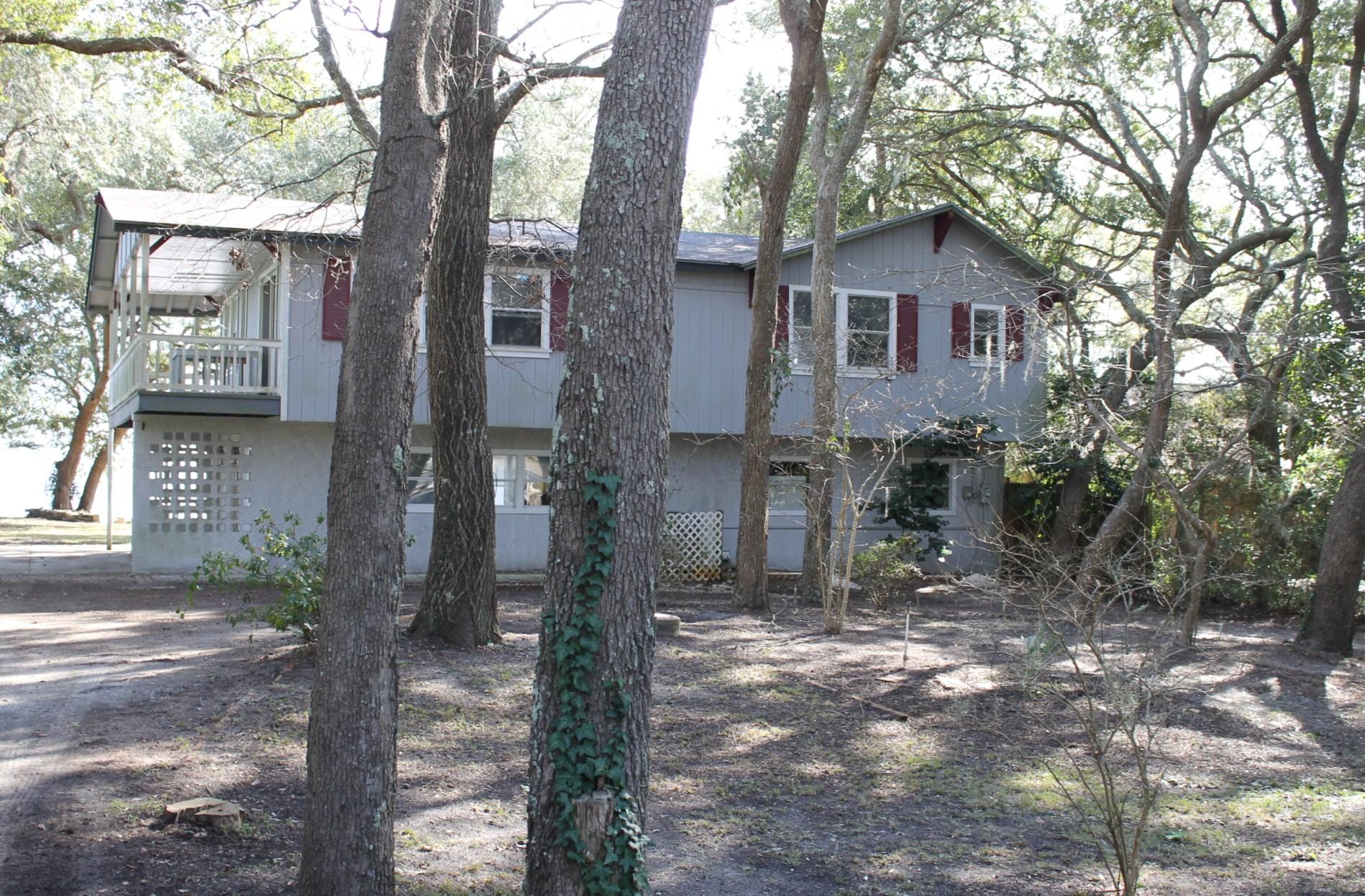 Here's your chance to own a fantastic ''Bay Front'' home. The home itself needs some work, but the lot is .44 acres, high and dry, with mature trees and tons of privacy.