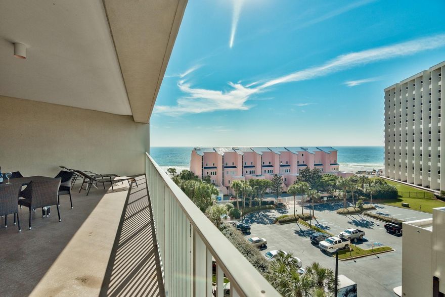 Fully furnished unit with huge patio and Gulf views  at Tops'l Beach and Racquet Resort! The Tides At Tops'l building has just completed a $5 million dollar renovation, to include new doors, new walkways and balconies, new pool deck and fence, and the exterior was just repainted as well. This spacious unit offers a fantastic open floor plan, tile throughout, granite counters, stainless steel appliances, and crown molding. Owners and guests at of Tides have their own exclusive Gulf front pool, as well as access to the Tops'l Resort pool and of course the deeded beach! You also have the option of joining the Tops'l Club, which offers tennis, racquet ball, fitness center, and indoor/outdoor pool as well. The Grand Boulevard Shopping Center is located less than half a mile away and features