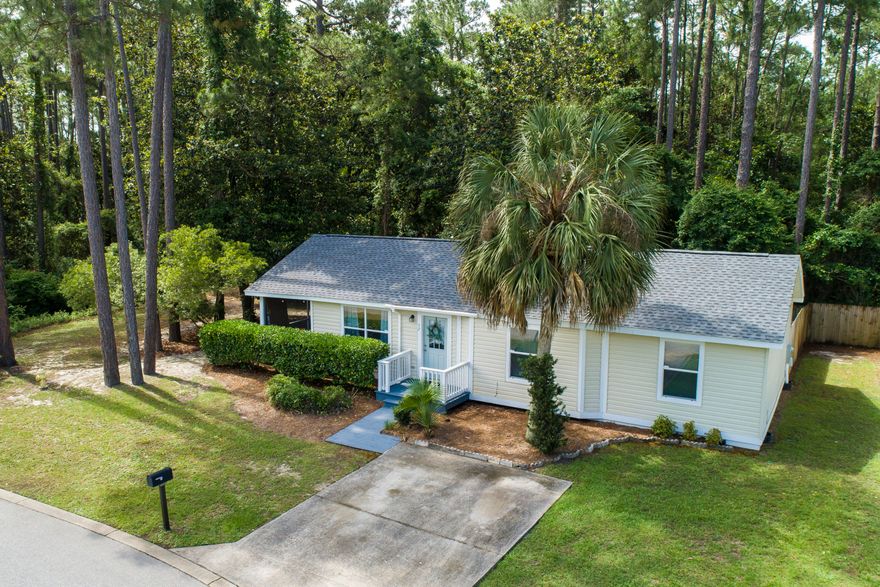 Location, location, location! This cozy 3 bedroom / 2 bath home is situated in a quiet neighborhood with community pool, close to everything! 1 mile from Cessna Landing Park and Public Boat Launch along Hogtown Bayou, just over 2 miles to scenic highway 30A and Gulf access with quick connections to both Highways 331 and 98. Lots of dining, shopping and entertainment options only a short car ride away. Freshly painted interior, fenced back yard with new deck, screened porch with ceiling fan, 2019 roof. Great natural sunlight. Lot borders a small creek so no immediate neighbor on the east side or south side.