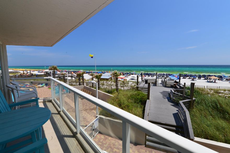 Every day is SUN Day at Beachside II #4219! Whether in the living room, the bedroom, or on the balcony the sun shines bright throughout! THIS CONDO IS ABSOLUTELY ADORABLE! Totally updated with coastal chic dcor. You will enjoy direct views of the gulf & white sandy beach with side views of the pool & gulf from all rooms. This unit is located so that the front door is on the deck walkway to the beach, allowing tons of natural light through walls of fantastic wrap-around windows. The kitchen is a knock-out with pretty granite, stainless appliances, beaded natural wooden vaulted ceiling & pendant lights. The master bedroom is extra-large & houses a king-sized bed. There is a sleeper sofa & loveseat sleeper so this unit will comfortably sleep 5. Other features include a stackable washer &