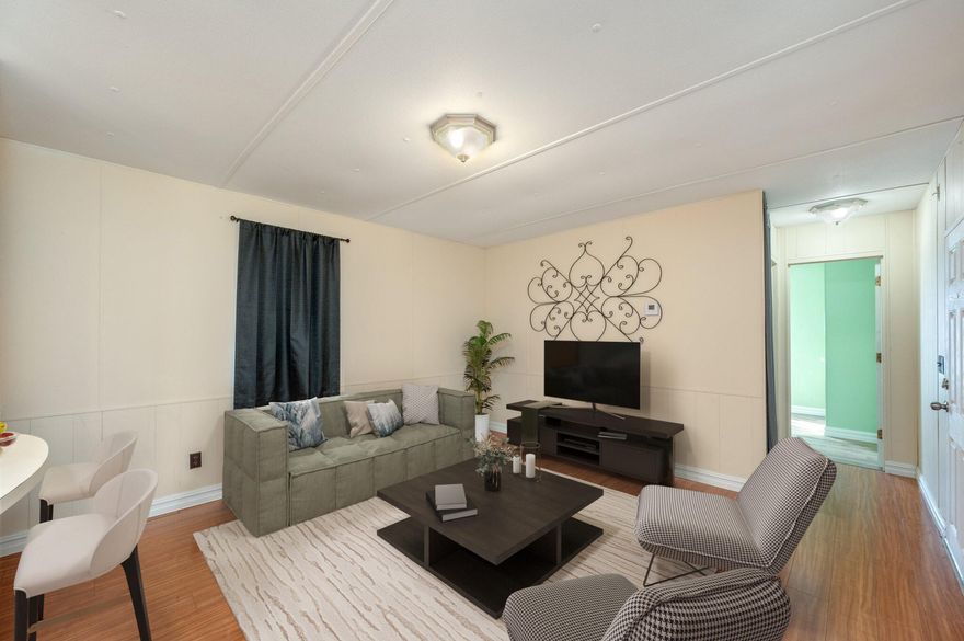 Step into your first home with ease! This unit combines comfort, functionality, and smart investment potential, making it perfect for first-time buyers or new investors.

Inside, you'll find an open kitchen layout designed for easy meal prep, with ample counter and cabinet space. The hard floors throughout are both stylish and easy to maintain. Outside, a fully fenced backyard offers a safe, open space for pets, while the screened front porch is perfect for relaxed mornings or evenings.

The home includes a versatile, insulated flex space, ideal for an additional living area, home office, or creative studio—whatever fits your needs. Plus, the washer and dryer convey, making moving in simple and hassle-free.

Financially, this home is a win. With an estimated monthly mortgage payment less than most rents, you can move from renting to owning while keeping costs low. For investors, the unit's rental potential is solid, with projected monthly income between $1,050 and $1,100, positioning it well for generating passive income in today's market.

Whether you're ready to own your first home or invest in a valuable rental property, this unit is a smart choice for taking your next step!