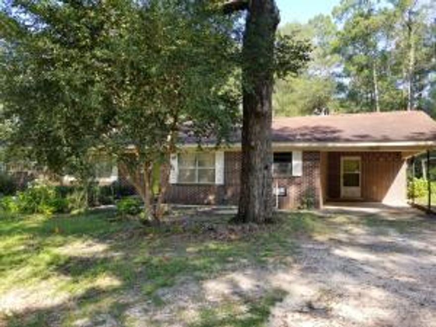 Country Living at it's finest! With a little TLC this quiet paradise would make a wonderful, private place to call home. Mature oaks grace the property along with camellias, hydrangeas, azaleas, and many more plants. Two acres give you plenty of room to spend time outdoors either watching the wildlife or doing projects in the shed. The huge screen porch would make a great place for coffee in the mornings! Bring your elbow grease and fresh ideas and make this home your own. Call today to set up a private showing! Buyer to verify all information deemed important.