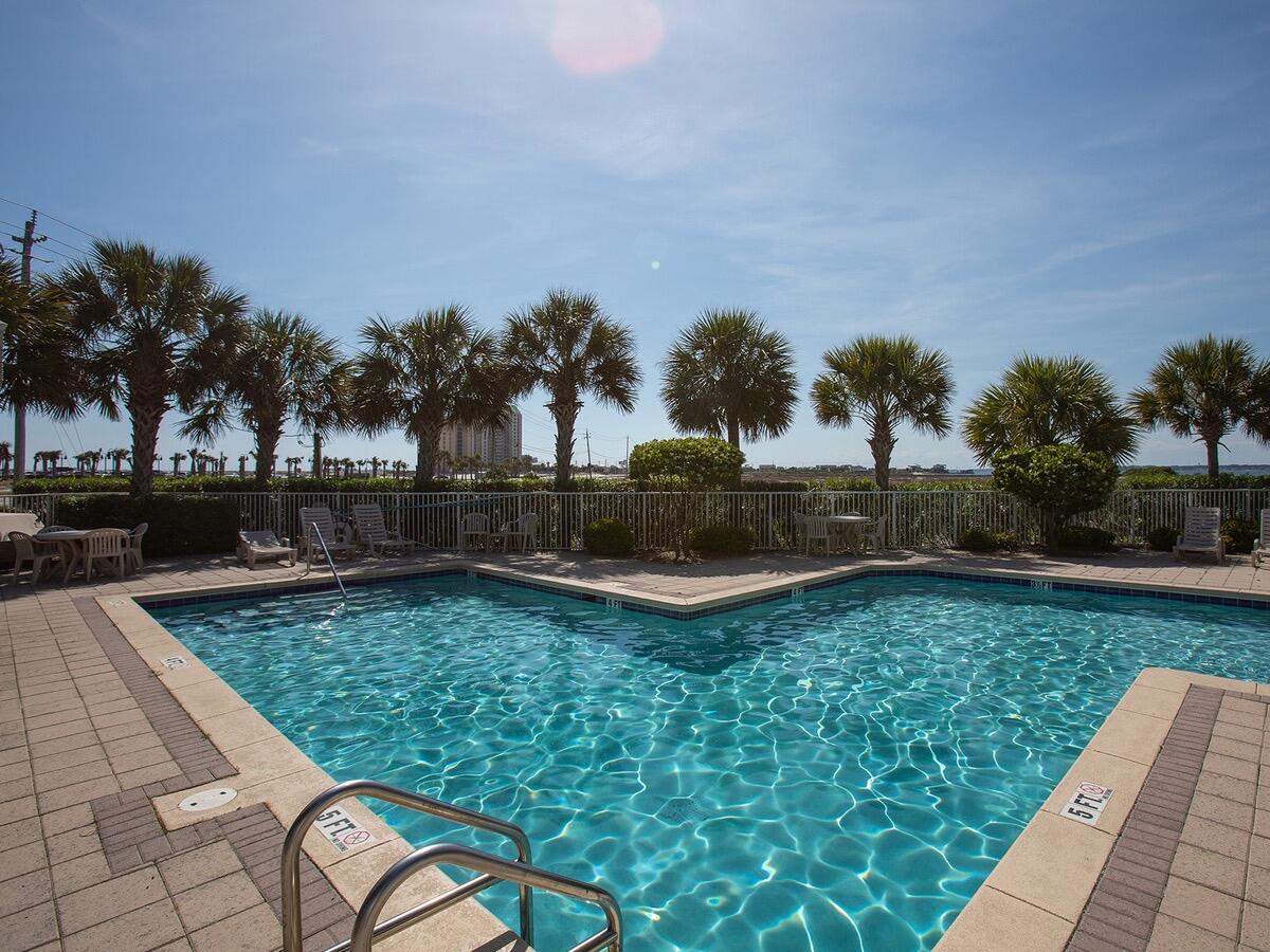 Located in the heart of Emerald Coast's sugar white sandy beaches. Private access to the sound side for the spectacular sunset watch, kayaking, surfboarding. Longest fishing pier in FL offers nearby dining/fishing. Complex offers a community pool and a separate grilling area for your enjoyment. AIRBNB,VRBO approved for the investors for an excellent rental income. Outside of the buildings are completely renovated in 2023. Upgraded granite countertops, stainless steel appliances, ceiling fans, storage space for Kayak/Surfboard for each unit on side of the building. Washer and Dryer 2020, HVAC 2019, Water Heater 2025. Furniture conveys but can be removed if buyer desires. Land Lease $250 a year.