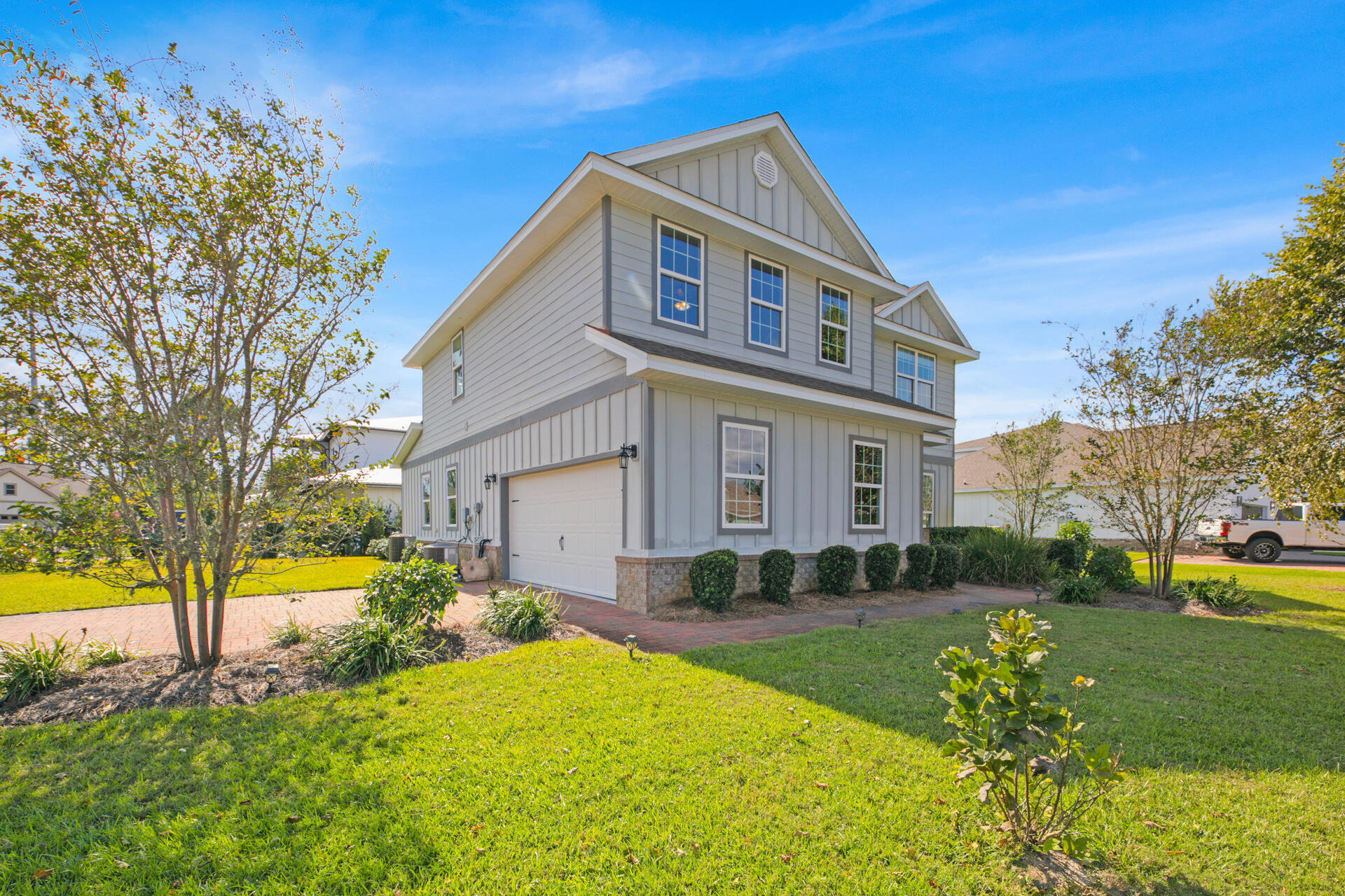 Gorgeous beach home located walking distance to Gulf Place and public beach access. This 4 BR 3.5 bath house is in the gated community Cypress Breeze located on a corner lot. This is a very well maintained home with one previous owner and has never been on the rental market. The home has a paved driveway with plenty of parking and a two car garage. It's an open layout with a large living area that flows into the kitchen with the master bedroom on the first floor. Upstairs you have another large living area with 3 bedrooms and two bathrooms. The outdoor area with a screened in tiled back patio with a fenced back yard is a perfect place to relax.  The community pool is 14k sq. ft. featuring 3 pools with waterfalls. This is a great home for a primary, second home, or vacation rental.