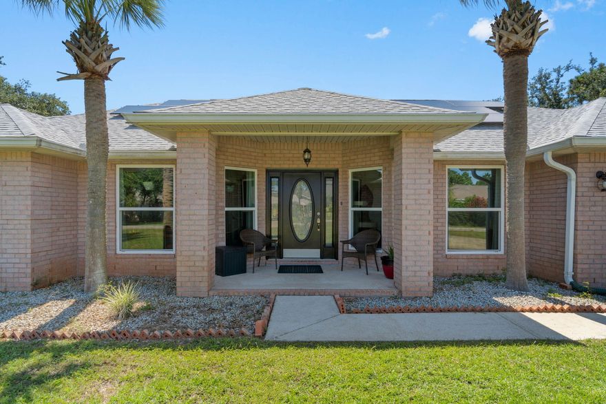 AMAZING!! 3 bedrooms, 2 bathrooms, bonus room, formal dining room, open floor plan with finished outbuilding, situated on almost a half an acre.  Home is COMPLETELY updated... New hurricane windows, GAS water heater, range and 2 gas fireplaces, gas is already plumbed in on patio and ready to install whole-house generator/gas grill/pool heater. Yard is ideal for a pool.   New roof in 2019, new HVAC in 2018, solar installed in 2019, new luxury vinyl plank flooring throughout, updated granite countertops, stainless steal appliances.  Outbuilding is finished, makes a great office or work studio, has kitchenette and a full bathroom see pics.  Sellers willing to contribute $ to buy down mortgage rate.  .