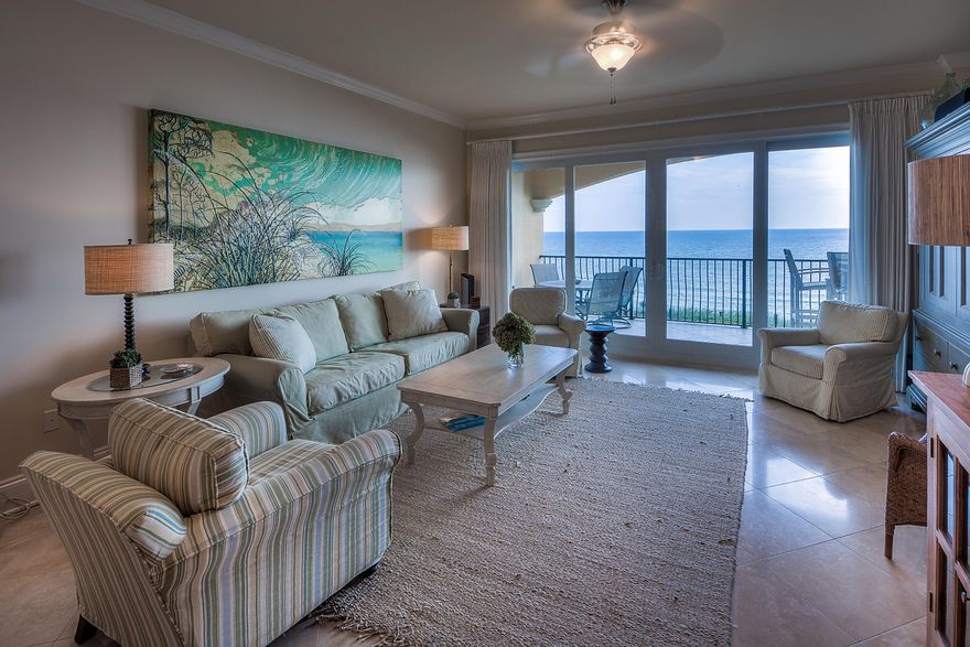 Few properties have better views of the Gulf of Mexico than this pristine four bedroom condo right on the ocean in Adagio. This pristine Gulf-front property has never been rented and provides a haven of luxury with stunning sea views from the generous balcony and open-plan living area. Diagonally laid tiles, chandelier lighting, crown moldings, plantation shutters in the bedrooms and a built-in wine refrigerator are just some of the extras included in this stately apartment. The diagonal tiles continue onto the balcony, which has uninterrupted views across the garden, beach and emerald Gulf waters from its elevated position. It's the perfect spot to enjoy cocktails and watching vivid sunsets cast a glow across the limitless sky. Wake up to more wonderful Gulf views from the master bedroo and linger in the spa-like master bathroom, which boasts a modern white jetted tub, oversize glass shower and twin vanity. The stellar gourmet kitchen maintains the highest standards with wood cabinetry, integrated stainless steel appliances and gorgeous granite counters which flow into an angled breakfast bar. Adagio is centered on an 8,000 square-foot central pool and fountains. A second beachfront pool, whirlpool tubs, fitness facilities and barbecue area make this luxury property the ideal choice as a vacation rental or second home.