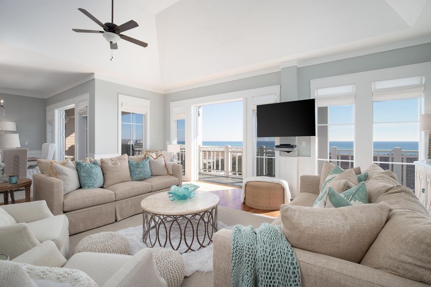 Luxurious top floor corner condo in sought-after Compass Point combining abundant space with a superb community lifestyle at WaterSound Beach. Gorgeously decorated with wainscot walls, newly updated lighting and gleaming wood flooring, this four-bedroom beach condo is the perfect place for spending peaceful days relaxing with friends or entertaining. Wind-sculpted dunes with waving sea grass are all that separate this stately condo from glittering gulf waters and the private white sandy beach. It's a world away from everyday stress and a rushed pace of life. Wake up to serene sea views from the large master bedroom and head out onto the private balcony for morning coffee and bagels.