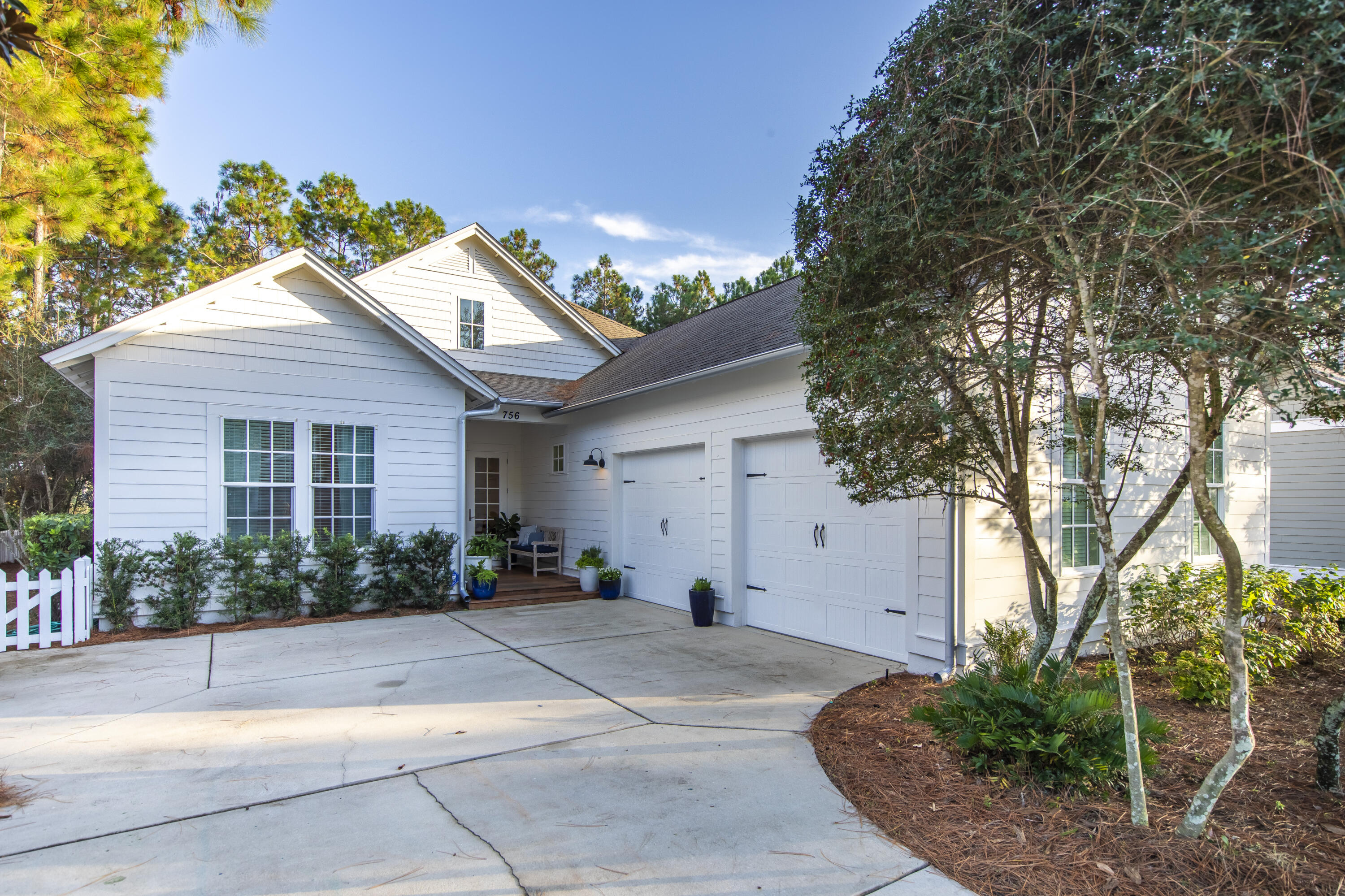 UNDER CONTRACT WITH 72 HOUR KICK OUT. A single level custom home in Watersound Origins fronting Winter Garden park, featuring three bedrooms and three bathrooms along with an office that could serve as an additional bedroom. The perfectly flowing living and kitchen area provides an exceptional space for entertaining. 11 foot ceilings, shiplap wall accents, custom shelving and a gas fireplace with a marble slab front highlight the living room. In the kitchen, you will find white quartz countertops, a marble slab backsplash and stainless appliances. The master bedroom features a vast en suite bath with double vanities, a spa tub, walk-in shower and a spacious walk-in closet. Adjacent to the single car garage is a conditioned 16x20 playroom that could easily be converted back into a 2nd bay, creating a 2 car garage2 sets of French doors on the park side of the house lead to a screened outdoor living and dining area, complete with a gas fireplace and summer kitchen. Enclosed by a 4 ft wooden fence, the carefully maintained yard offers exceptional privacy with mature plants and trees. Walk out the back gate and enjoy the many trails and parks that the community offers. Amenities abound in this St Joe community including Origins golf course, extensive walking trails, neighborhood parks, community pool, children's play area, fitness center and village commons area. Bike or golf cart to Publix located at the entrance to the neighborhood. The beach is only a couple of miles away, along with shopping and dining along Hwy 30A. Schedule your private tour of this unique Watersound Origins home today!