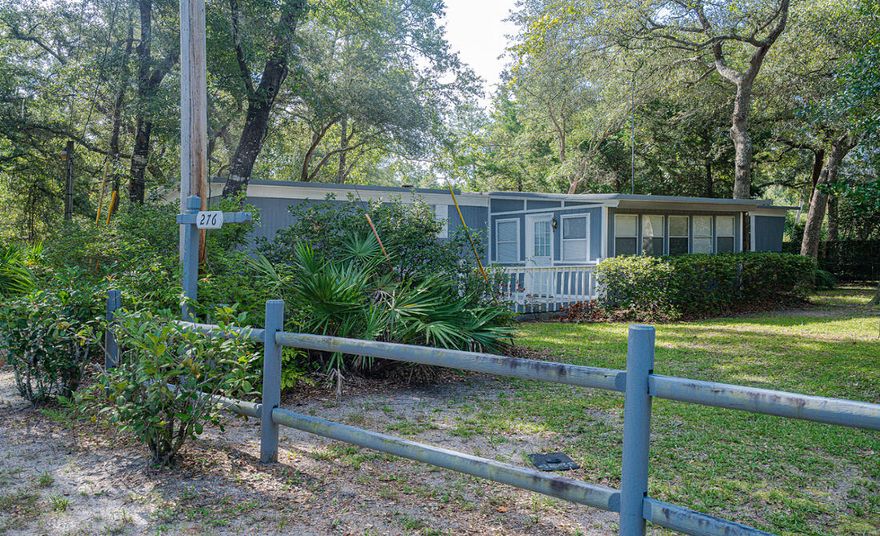 BLACK CREEK GET-A-WAY!  Fully Furnished & Ready for Vacation Fun! Ideal for Vacation Rental, AirBNB or Personal Escape for Fishing, Boating, Beach, Shopping, & More! Recently renovated w/newer Kitchen & appliances. LVP Flooring throughout, Guest BR w/Double Bunks. Deck has awning w/drapes & screens. Shaded yard for the ''back to nature'' feel. Unrestricted area - no HOA! Close to Black Creek Lodge w/Boat Launch, Gas & Marina. LIve Oak Landing close by w/RV Sites for friends & family w/RVs. Close to Rivers & Bays - great fishing! - as well as the County Bayfront Park & Launch at the foot of the Hwy 331 Bridge. Approx 15 minutes to the Beaches of South Walton & less than 30 min. to Sandestin, Destin, Seaside, Rosemary Beach, Inlet Beach & More!  Must see to appreciate this rare find!