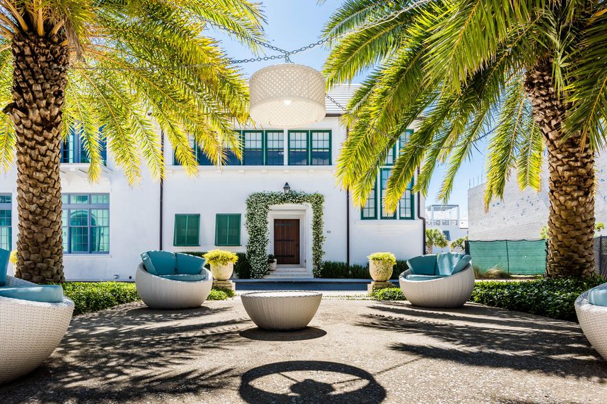 Located on the beach-side of Florida's Scenic 30A, this professionally furnished courtyard home is just a few short steps from what The New York Times said may be the best beach in the continental U.S. Designed by internationally renowned architects Ike Kligerman Barkley of New York, this new home features 4 bedrooms and 3 1&#8260;2 baths. Two of the ground floor's three bedrooms open directly to the large private courtyard, which features a very large swimming pool, sunning deck with an exquisite outdoor dining loggia. This amazing outdoor space is ideal for entertaining. Cypress hardwood flooring throughout the second floor gives the home a warm, open feeling with pecky cypress ceiling in the main living areas. The gourmet kitchen is fully equipped with stainless steel appliances,