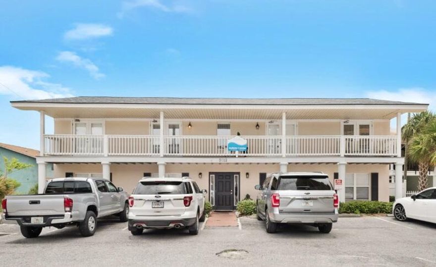 Own your on four unit Condo Complex.  Building has four 2 bedroom / 2 Bath condos.  NO HOA.   Located across the street from beach access between Treasure Island , Seychelles Condos, and Schooners.  In ground pool is provided for the units with abundant parking.  This quadplex has four separate deeds and tax ids.  While it could be split, owner would like to sell as a whole. This is an income producing short term rental complex that is professionally managed.  Sold fully furnished as a turn key rental machine.