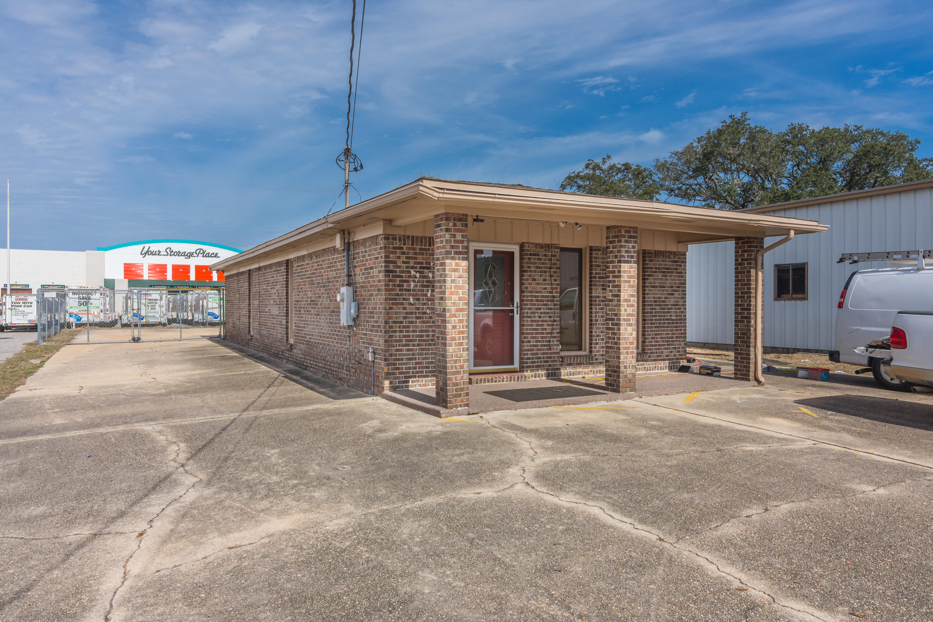 Great office location in the heart of FWB! This office space has an ample parking lot and easy access from both Beal Pkwy. and Eglin Pkwy. There is an existing sign that has lighting. The back parking area is large and features a double gate to drive and store vehicles in the gated back parking lot. In addition there is a 20 x 20 storage shed in the back for your storage needs. The interior of the building has a large entry room, two offices and bathroom. This commercial space is multi use for retail, office, storage, or more!
