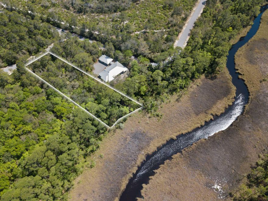 ''Waterfront Lot'' at The Estuary, a premiere gated Bay Front community in South Walton, completely surrounded by either water or State Forest. The subdivision retained as much of the native vegetation as possible and features huge oaks, pines, magnolias, etc. It must be seen to be truly appreciated. An amazing opportunity to build your dream home.