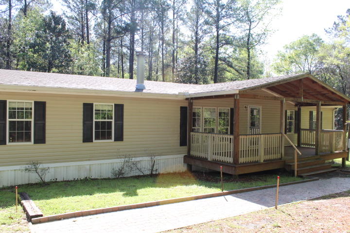 REO. Spacious 3 bedroom 2 bathroom home on over 4.5 acres! Home opens to a large living room with wood burning fireplace. Just off the living room is the kitchen/dining area and master suite. The master bedroom is big and features an upgraded walk in closet. Master bathroom has double vanity sinks, double seated shower, and separate garden tub. Split floor plan allows the other 2 bedrooms, full bathroom, and utility room to be on the opposite end of the home. Both additional bedrooms are approx. 14' X 14'! The home features 2 enormous decks which are perfect for entertaining! Call today to schedule your tour. Property sold ''as-is.''
