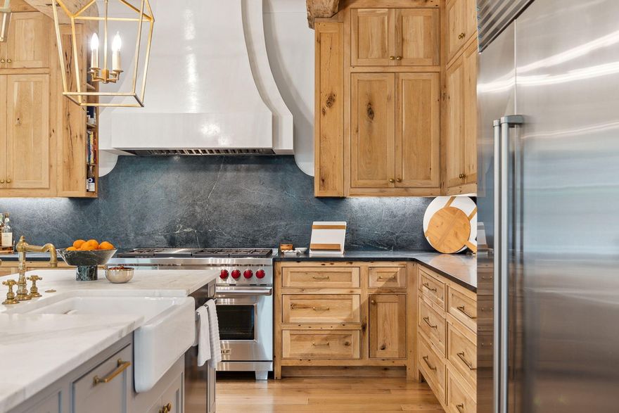 This stunning 7-bedroom, 9-bathroom estate on the south side of Rosemary Beach has been artistically transformed into a true architectural masterpiece. Taken down to the studs in 2019, the home has undergone a meticulous, top-to-bottom renovation and has continued to be thoughtfully enhanced over the past five years--resulting in the immaculate condition you see today. A seamless blend of timeless antique details and sophisticated modern upgrades creates an ambiance that is both luxurious and inviting. Recent improvements include a brand-new roof, a beautifully appointed outdoor summer kitchen, fresh interior and exterior paint, and a protective garage floor coating. Every detail has been curated to the highest standards, making this one of the most impressive and well-finished homes in the entire community. Pre-inspected for your peace of mind, this home is ready to welcome its next discerning owner.

The home showcases a masterfully redesigned floor plan appointed with reclaimed antique oak  and designer finishes throughout.The chef's kitchen boasts beautiful artisan designed inset cabinets, Wolf and Sub-Zero appliances, soapstone counters, and a Calcutta gold marble island beneath reclaimed beams from a Kentucky tobacco barn

Venetian plaster, stone mantels, and brass fixtures elevate the interiors, while the spacious master retreat offers comfort and serenity just off the main living area.

Outside, a heated pool, copper lanterns, and bi-level carriage house complete the picture. Steps from the beach, this is refined coastal living at its finest.

