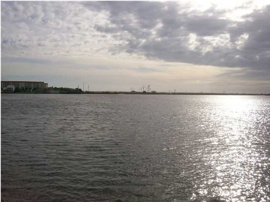 Great 2nd floor 2 bedrm condo in a waterfront community. All electric! Condo has a balcony off back overlooking the grassy common area great for relaxing/entertaining. Complex is located right on Hwy 98 close & convenient to schools, shopping, restaurants & in the middle of both bases. This condo community offers a waterfront in ground swimming pool, sundeck, beach, dock/boat slips, lighted tennis courts, laundry rm, club house w/ a kitchen, sauna, showers, restrooms, pool table & ping-pong table & trailer/boat parking/storage. Note: there is NOT washer/dryer hookups in the unit itself. Boat slips can be rented from the HOA for an extra fee w/ availability.