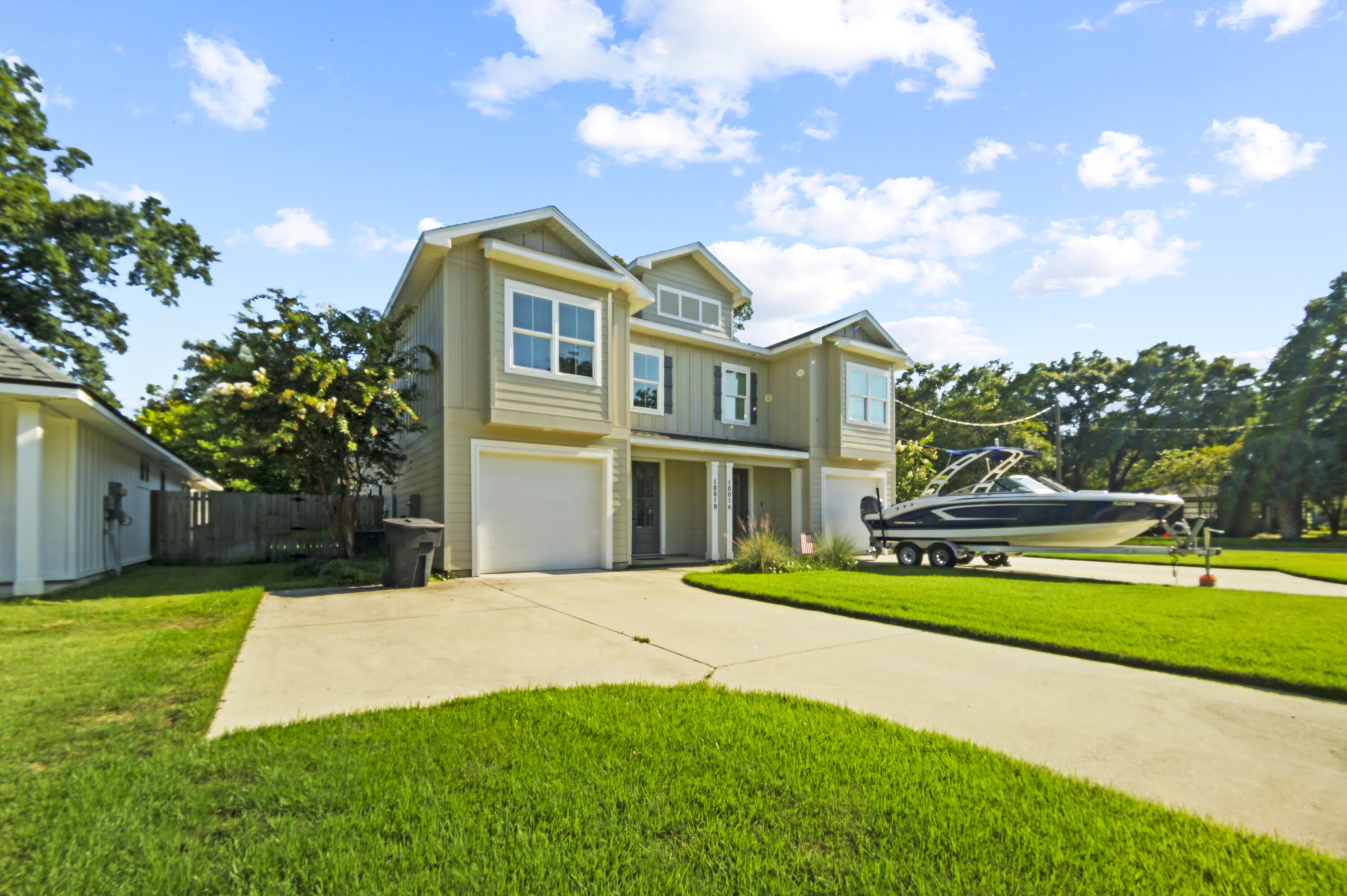 LIKE NEW! This home was used only a handful of times as a second home, leaving it in immaculate, untouched condition. Built in 2021, this home has all the modern bells and whistles in Pensacola's most desirable neighborhood: EAST HILL! Stepping inside, the floorplan is a perfect split providing privacy to the bedrooms upstairs and an open concept living area downstairs. The kitchen is a chef's dream featuring quartz countertops, tons of white shaker cabinetry, a huge island/breakfast bar combo, a gas stove, a massive french door fridge, a huge pantry, and even a pot filler. Seamlessly connected is the living room overlooking the backyard, complete with a fireplace. Upstairs the spacious master bedroom has a trey ceiling and a HUGE walk-in closet. The master en-suite bathroom has a double vanity, an oversized tile shower, a linen closet, and private water closet. The additional two bedrooms can easily accommodate master beds and share a large, modern bathroom in the hallway with a tile-walled bathtub. With NO CARPET THROUGHOUT, LED recessed lighting, high impact windows, and a tankless water heater Luxury plank vinyl can be found throughout the entire home along with LED recessed lights and high impact rated windows, this home has it all. The yard is surprisingly spacious with more than enough room for any projects you may have in mind, or just relax on the large covered patio with a cup of coffee! This property is a MUST SEE and unlike anything currently listed in East Hill!