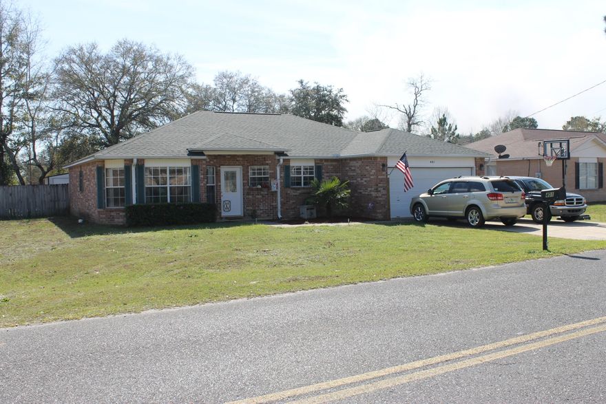 ENJOY THE DAILY CONVENIENCE of this SOUTH OF I-10 address! All brick 3/2 split floor plan on corner lot. Open & spacious design lends itself nicely to entertaining or family fun. Formal dining area can be used for office, library, play roomwhatever works for your family. Large, bright eat-in kitchen has powered island/breakfast bar combo and nice sized pantry. Laundry room is located off the kitchen. All wet areas tiled. Great Room is open with high ceilings and a fireplace. French doors lead to back patio with Pergola and fenced back yard!Large Master bedroom, master bath offers his and her walk in closets, double vanities, garden tub with separate shower.Roof replaced in 2012, septic lines replaced in 2015. Seller will pay most closing costs!