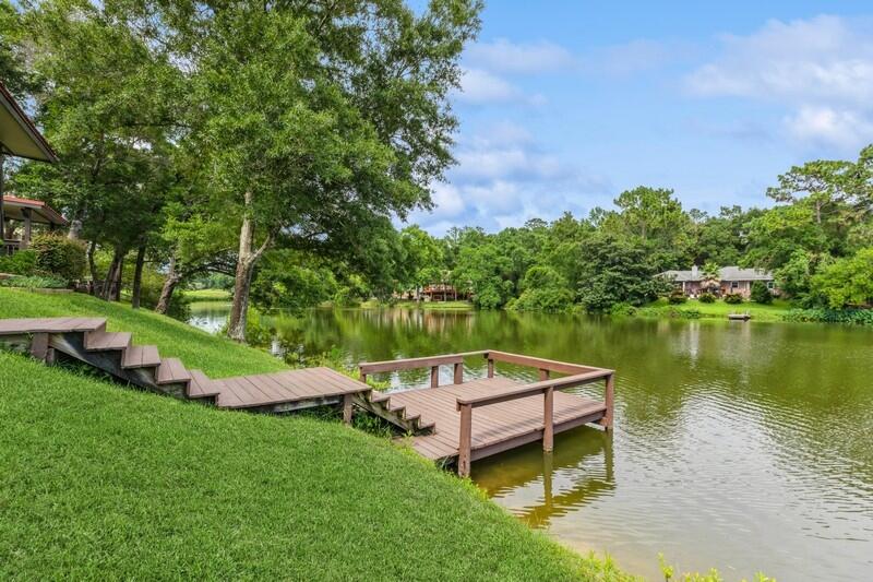 Bienvenue to your own slice of lakeside charm on Lake Henderson! This beautifully maintained villa exudes a French New Orleans flair, blending timeless elegance with effortless comfort. Thoughtful updates throughout, the home offers peaceful water views from the primary bedroom, family room, dining area, and expansive rec room--perfect for both quiet mornings and vibrant gatherings.Step outside to enjoy covered decks that overlook the serene lake, a large private courtyard ideal for entertaining, and a shared dock that invites endless waterfront enjoyment. Indoors, there's ample storage, an oversized 2-car garage, and the security of a whole-house generator and transferrable termite bond.The 2025 4-point inspection notes 22 years of useful life remaining on the durable metal roof, giving you peace of mind for years to come. Located directly across the street from the popular Rocky Bayou Golf Course, and with lawn care conveniently handled by the HOA, this villa combines luxury, low-maintenance living, and enviable location in one exquisite package.
Whether you're entertaining guests or enjoying a private lakeside retreat, this is Florida living at its finest.