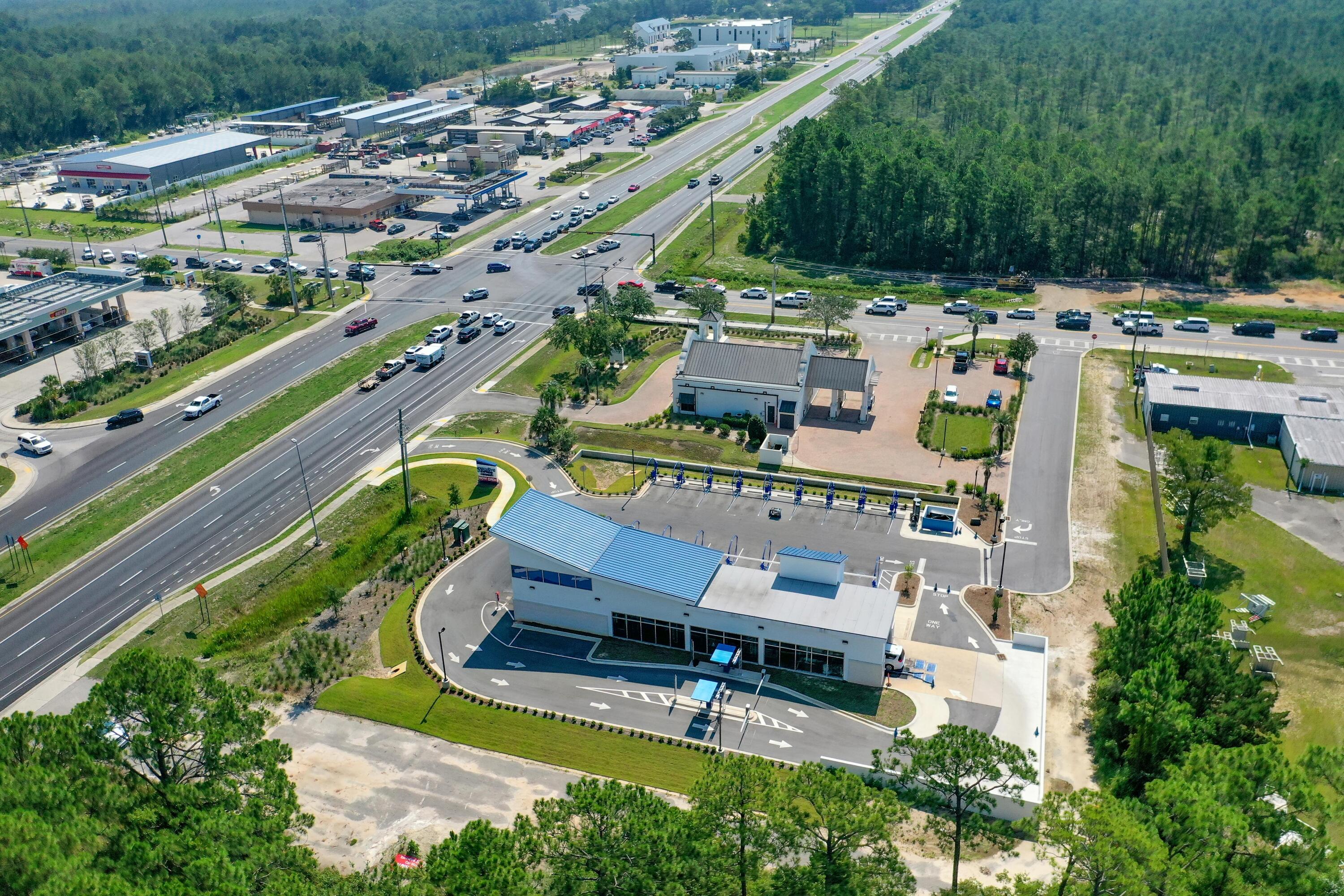 SIGNIFICANT PRICE REDUCTION!  Newly developed, state-of-the-art car wash, now offered for sale. Located within the flourishing market of Santa Rosa Beach, Florida, this prime site is adjacent to the new United Bank at CR 393 and Highway 98, ~2 miles North from Scenic 30A. The Annual Average Daily Traffic is approximately 40,500. Yielding nearly 200' along Highway 98, this approximate (1)-acre parcel contains a newer concrete building with eye-catching architectural appeal, which incorporates the most advanced and innovatively engineered car wash tunnel and an (18) vacuum system, offering the most productive output amidst intense demand. The buyer of this new facility will enjoy the synergy of surrounding new developments underway, soon to be debuting renowned national tenants that will... magnetize the traffic flow to this car wash site.  Please inquire to ascertain additional details.